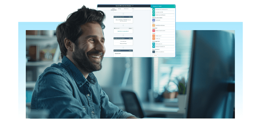 Graphic of a professional using HubSpot, looking contented and happy